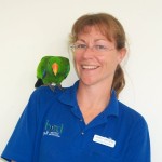 Sandy & one of her rescued Eclectus parrots
